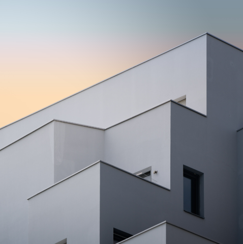 vertical-low-angle-shot-white-concrete-building